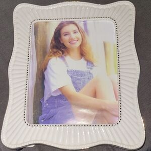 Gold embossed Mikasa porcelain 8x10 frame.